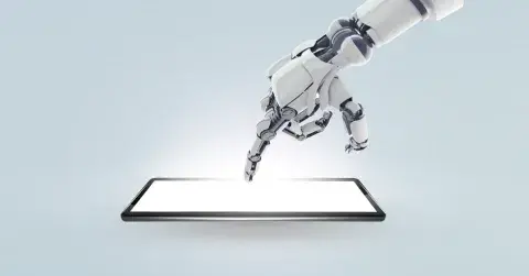 Robotic hand touching a screen